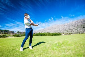 swing a golf club right-handed